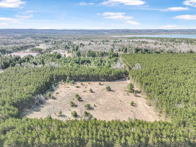 7020 NW Round Lake Road, Rapid City, MI 49676