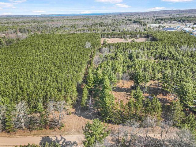 7020 NW Round Lake Road, Rapid City, MI 49676