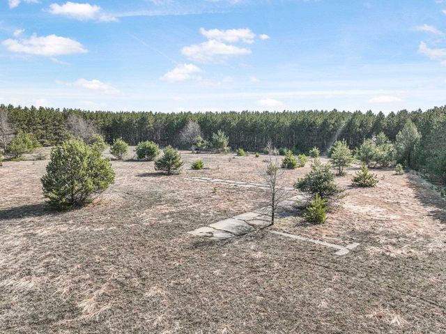 7020 NW Round Lake Road, Rapid City, MI 49676