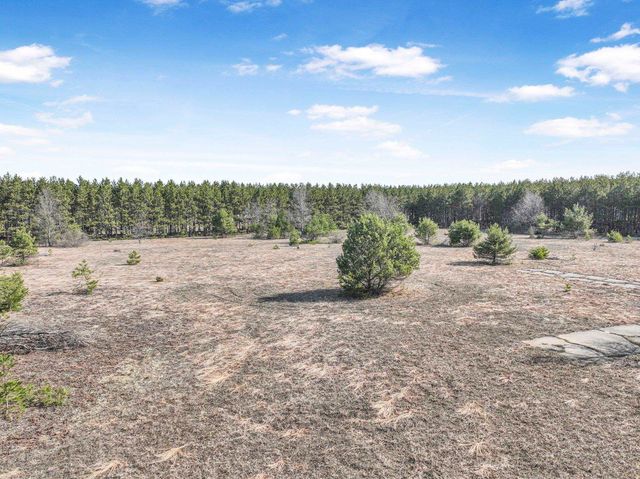 7020 NW Round Lake Road, Rapid City, MI 49676