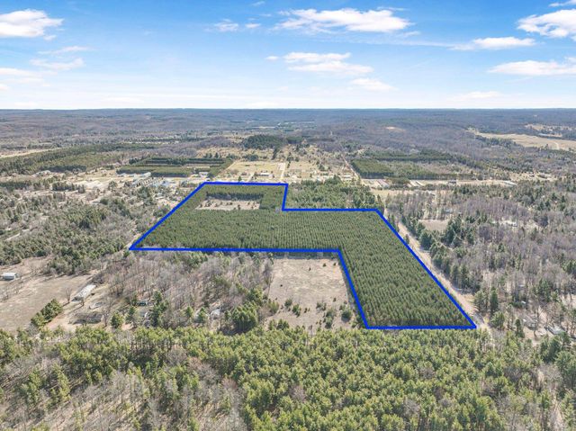 7020 NW Round Lake Road, Rapid City, MI 49676