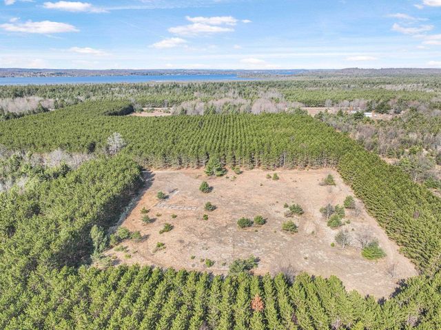 7020 NW Round Lake Road, Rapid City, MI 49676