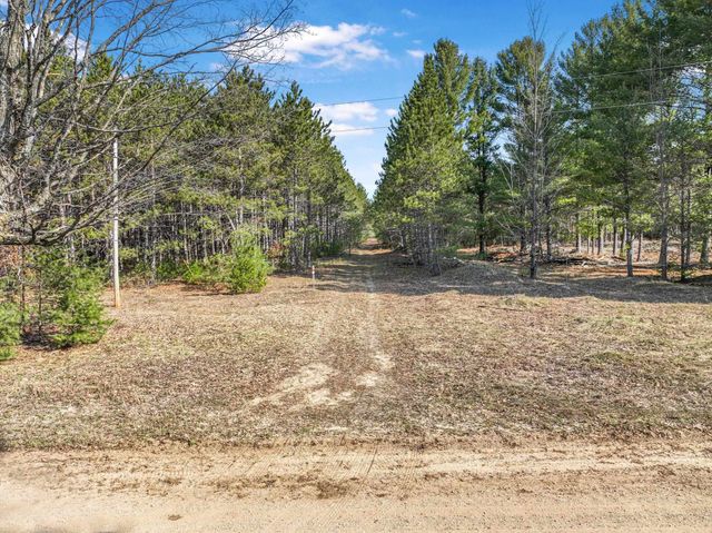 7020 NW Round Lake Road, Rapid City, MI 49676