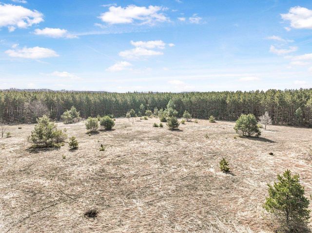 7020 NW Round Lake Road, Rapid City, MI 49676