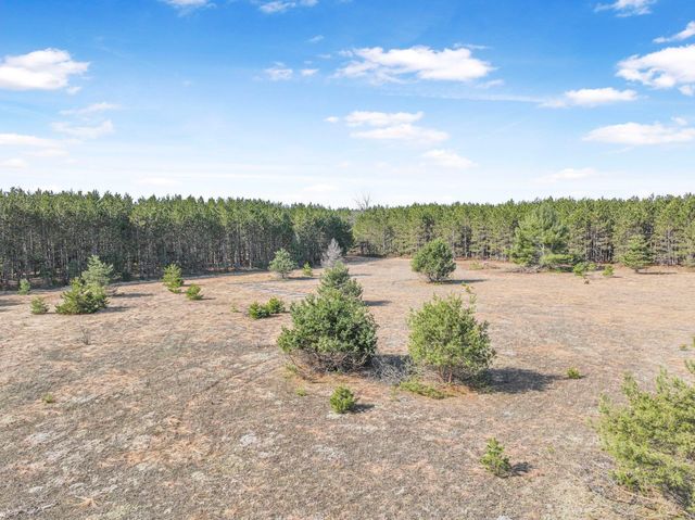 7020 NW Round Lake Road, Rapid City, MI 49676