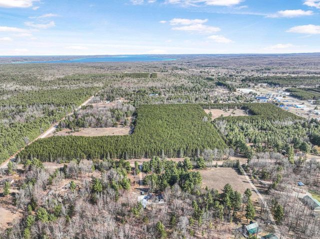 7020 NW Round Lake Road, Rapid City, MI 49676