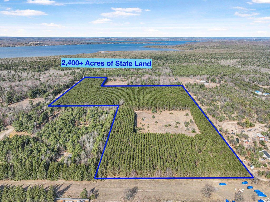 7020 NW Round Lake Road, Rapid City, MI 49676