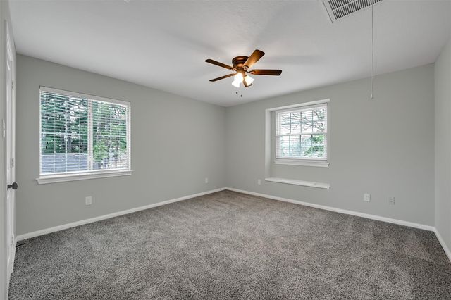 12744 Point Aquarius Boulevard, Willis, TX 77318
