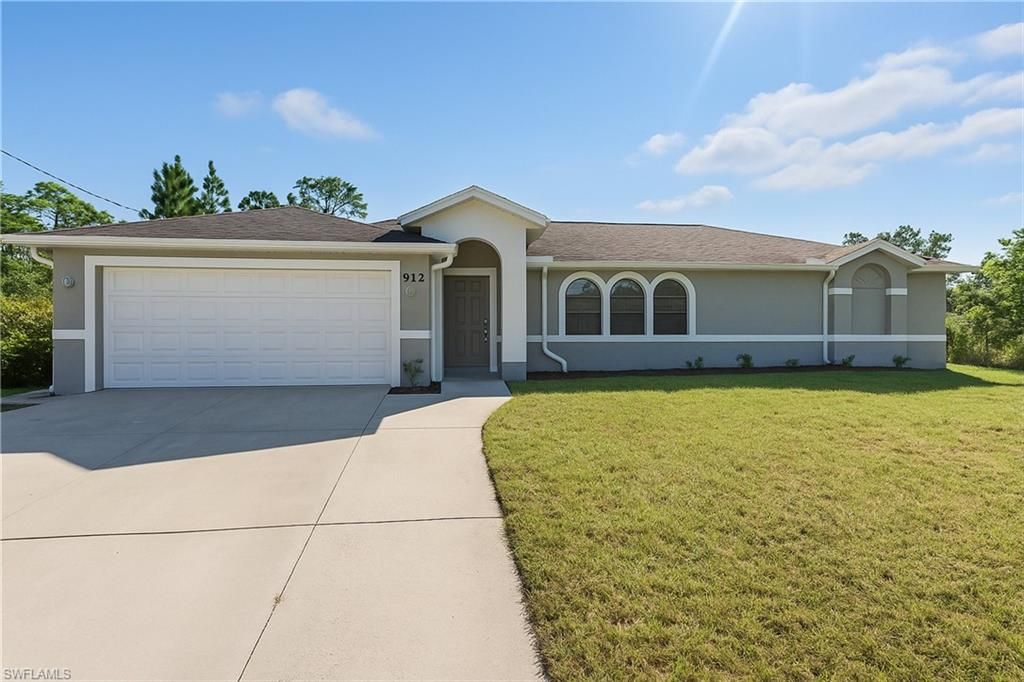 912 Lincoln AVE, LEHIGH ACRES, FL 33972 — exterior