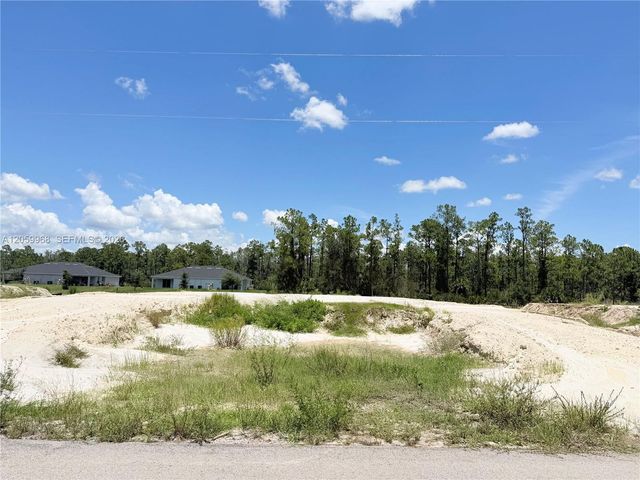1942 Victor Lane, Lehigh Acres, FL 33972