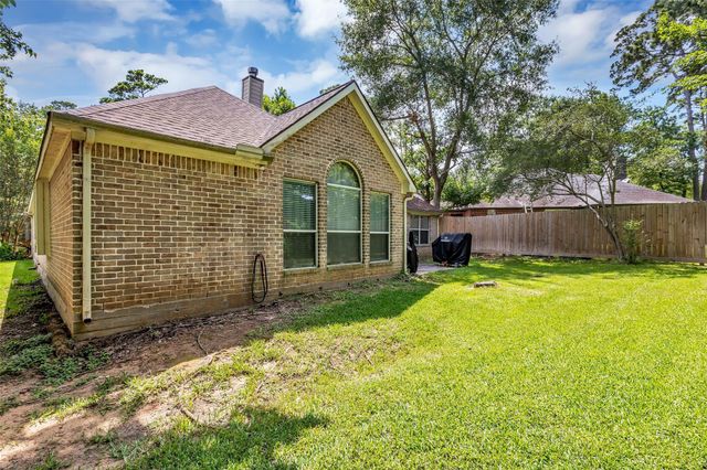 107 Dawns Edge Drive, Conroe, TX 77356