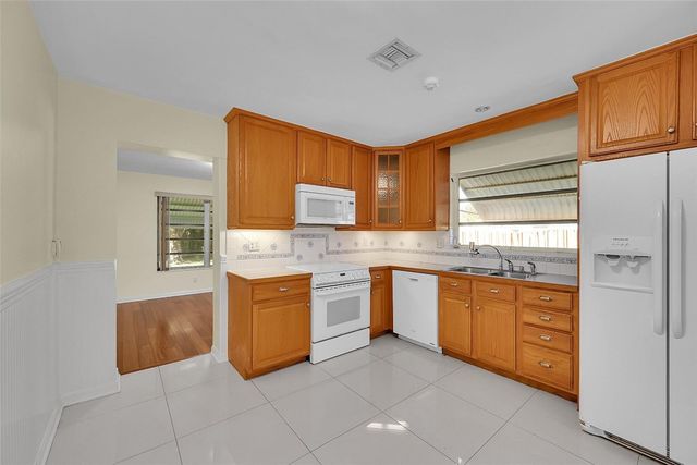 881 NW Zinnia Lane, Plantation, FL 33317