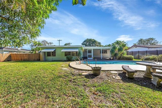 881 NW Zinnia Lane, Plantation, FL 33317