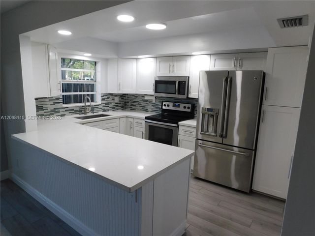 12164 SW 52nd Place, Cooper City, FL 33330