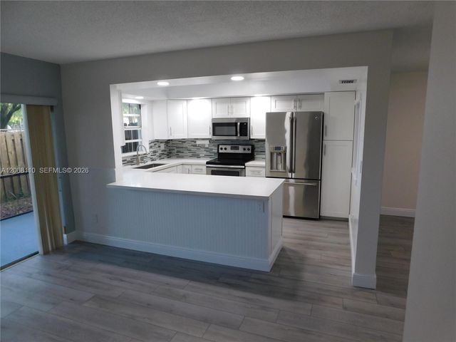 12164 SW 52nd Place, Cooper City, FL 33330