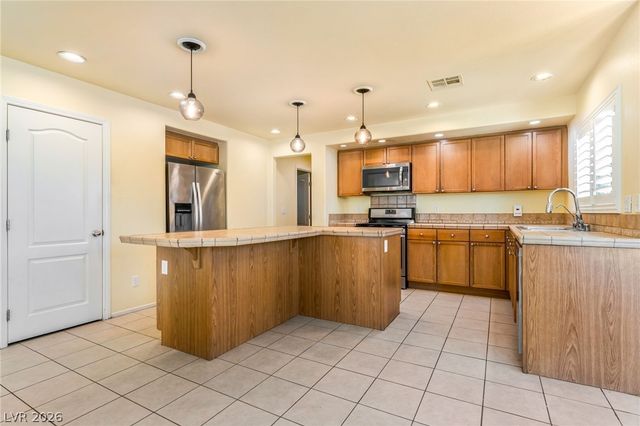 7038 PINK FLAMINGOS Place, North Las Vegas, NV 89084