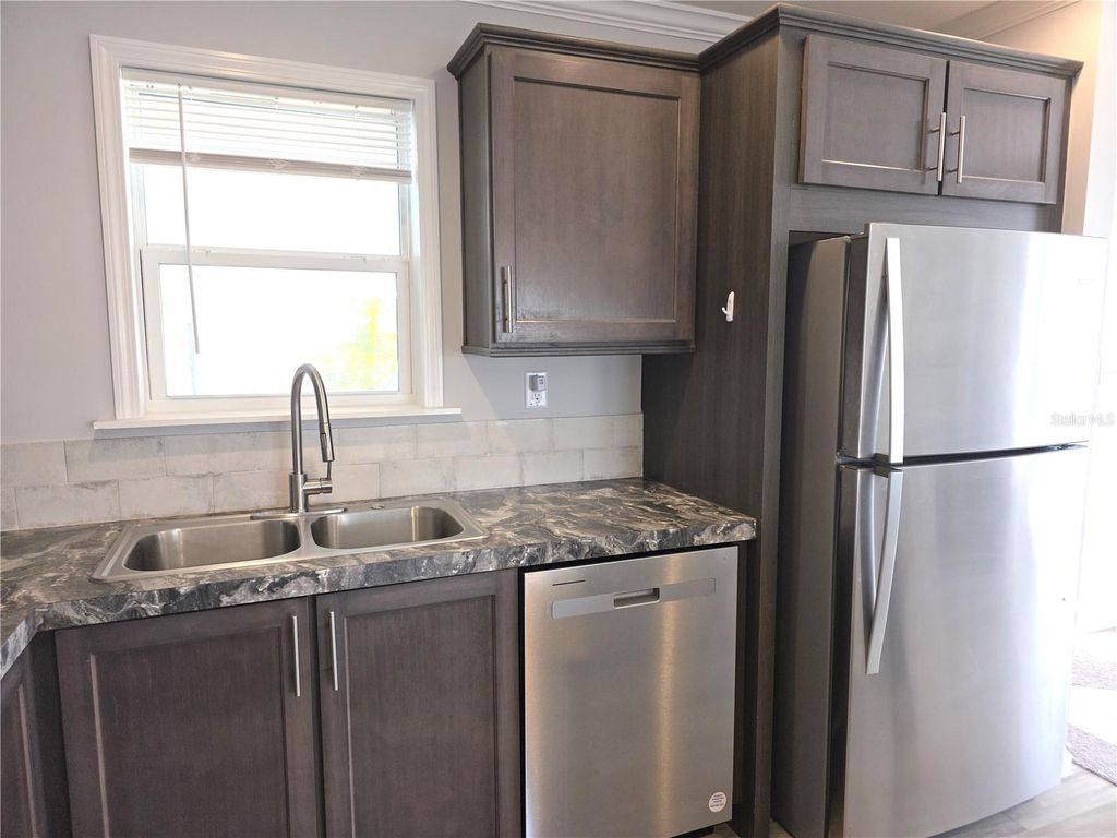 Image 4 of property listing at 236 WOLVERINE AVENUE, North Port, FL 34287