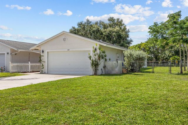 136 Sparrow Drive B, Royal Palm Beach, FL 33411