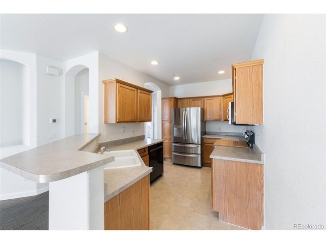 8976 Fox Dr 1-102, Denver, CO 80260
