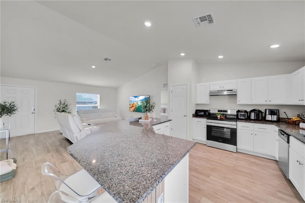 1219 NW 15th TER, CAPE CORAL, FL 33993 — photo 4