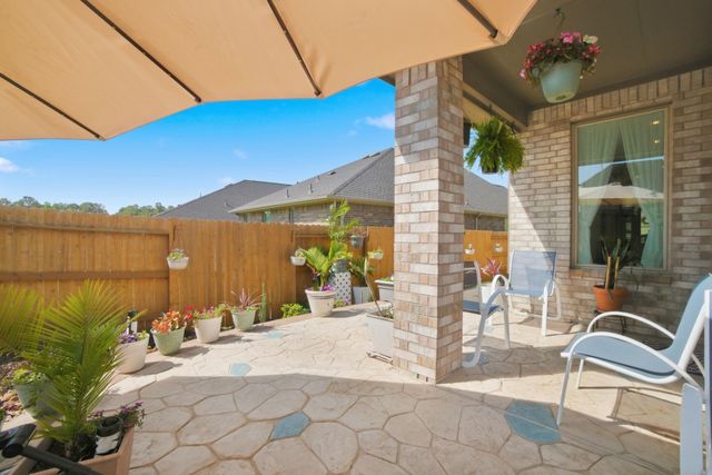 1409 Northwood Bluff Lane, Pinehurst, TX 77362