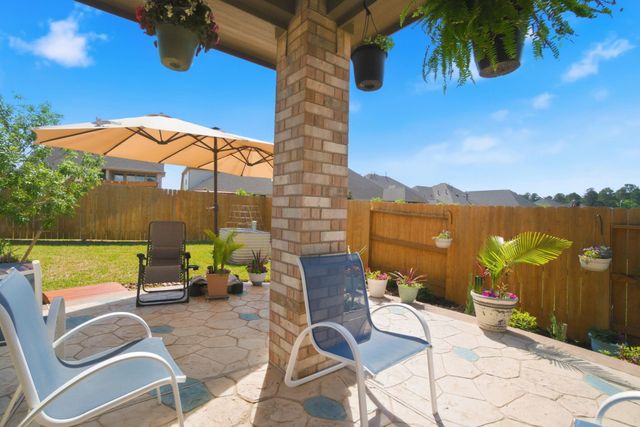 1409 Northwood Bluff Lane, Pinehurst, TX 77362