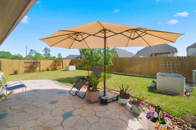 1409 Northwood Bluff Lane, Pinehurst, TX 77362