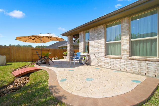 1409 Northwood Bluff Lane, Pinehurst, TX 77362