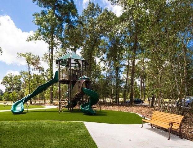 1409 Northwood Bluff Lane, Pinehurst, TX 77362