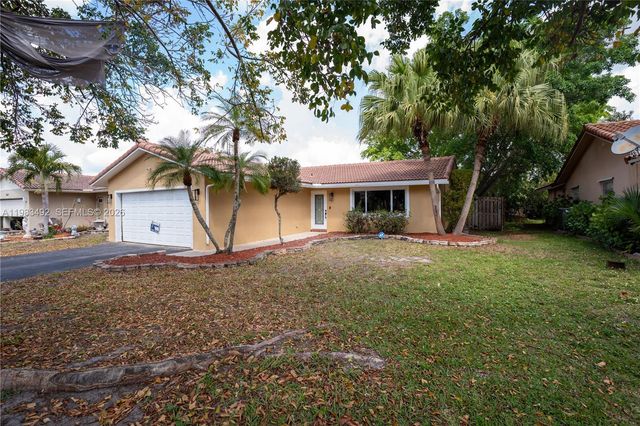 8915 NW 26th Ct, Coral Springs, FL 33065