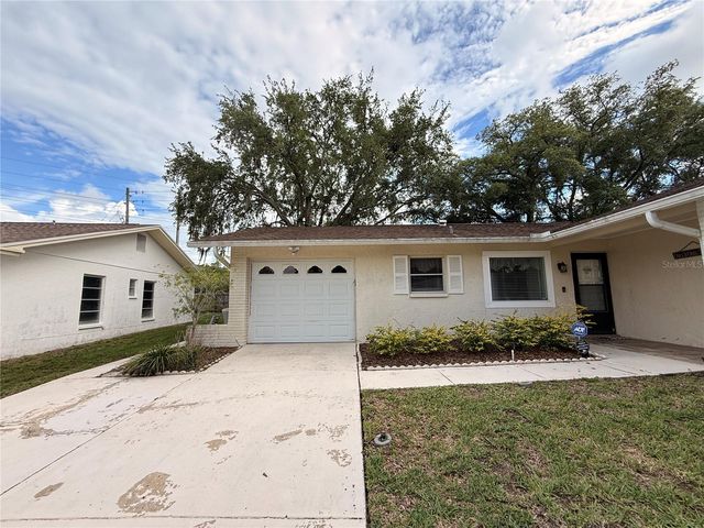 8634 WINDING WOOD DRIVE, Port Richey, FL 34668