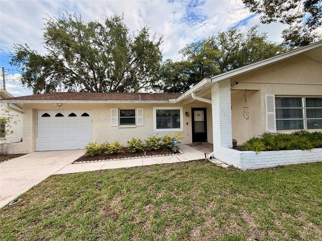 8634 WINDING WOOD DRIVE, Port Richey, FL 34668