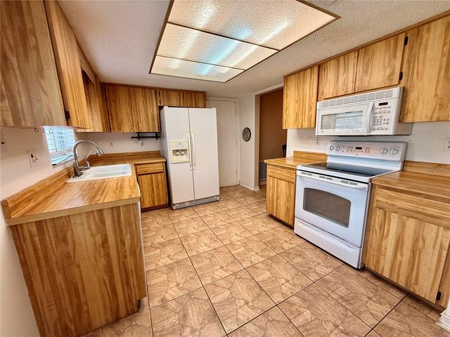 8634 WINDING WOOD DRIVE, Port Richey, FL 34668