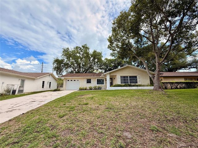 8634 WINDING WOOD DRIVE, Port Richey, FL 34668
