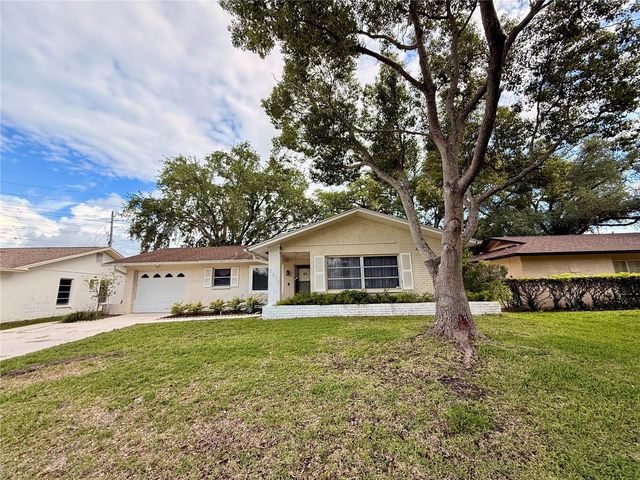 8634 WINDING WOOD DRIVE, Port Richey, FL 34668