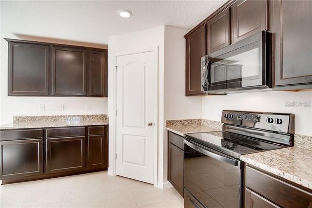 1597 ORNE STREET, Mascotte, FL 34753