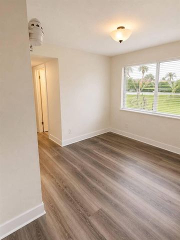 700 NOTTINGHAM Circle E, Greenacres, FL 33463