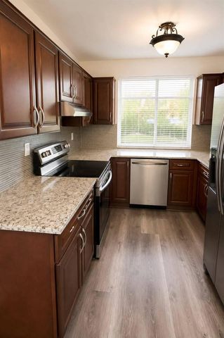 700 NOTTINGHAM Circle E, Greenacres, FL 33463