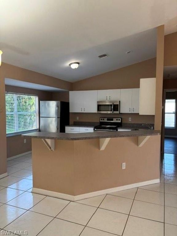 Image 2 of property listing at 1822 SW 18th ST, Cape Coral, FL 33991
