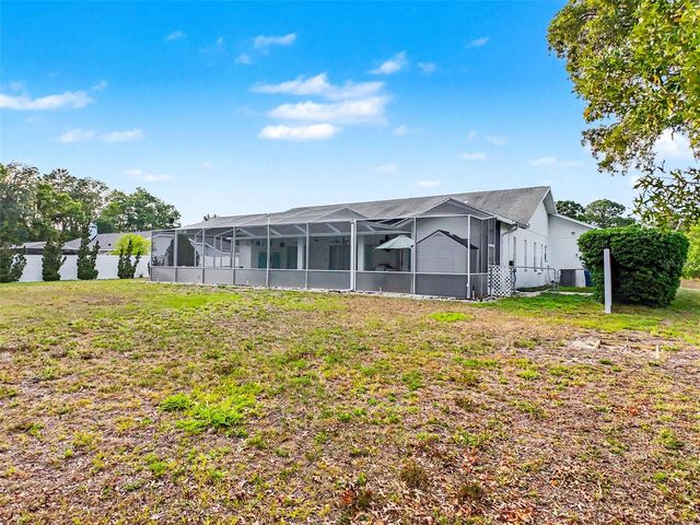 11344 RAINBOW WOODS LOOP, Spring Hill, FL 34609