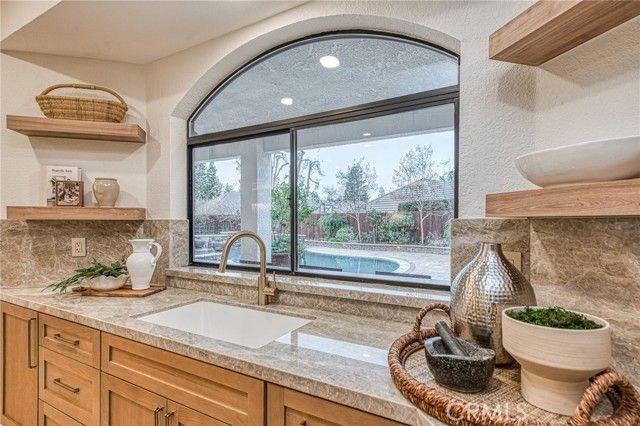 9381 N Woodmont Drive, Fresno, CA 93720