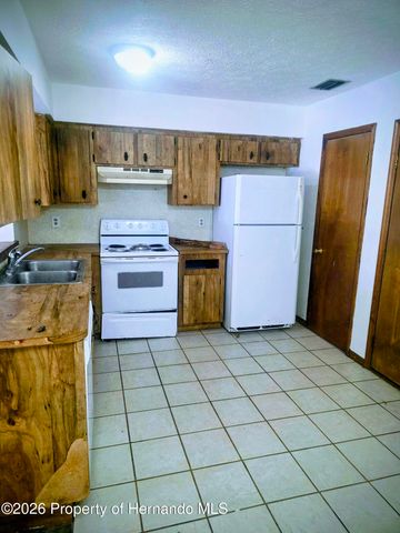 822 Village Drive, Brooksville, FL 34601