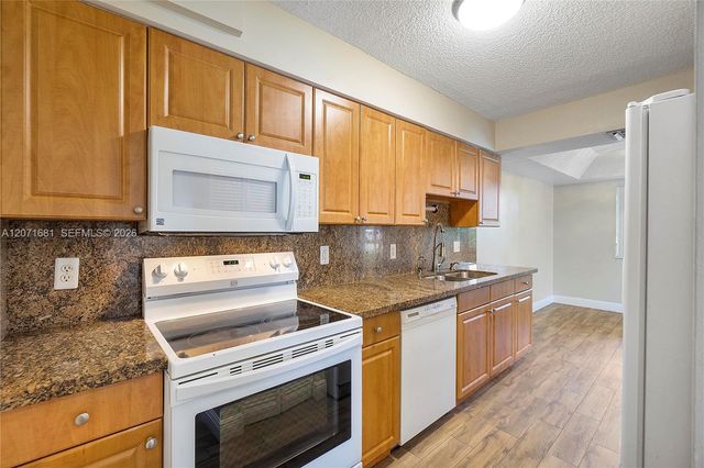 937 NW 104th Way, Coral Springs, FL 33071