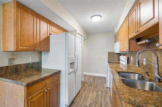 937 NW 104th Way, Coral Springs, FL 33071