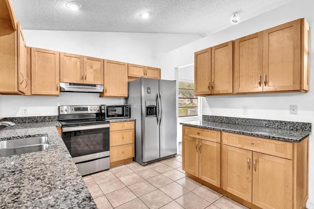 425 Shadow Wood Lane, Coral Springs, FL 33071