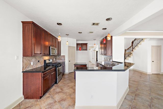 14226 Ashmore Reef Court, Sugar Land, TX 77498