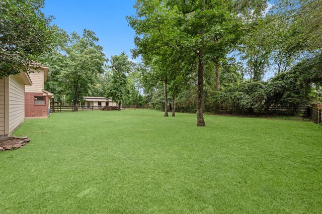 6221 Ranch Lake Drive, Magnolia, TX 77354
