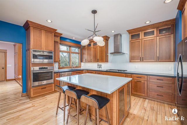 9100 Twin Oaks Lane, Ada, MI 49301