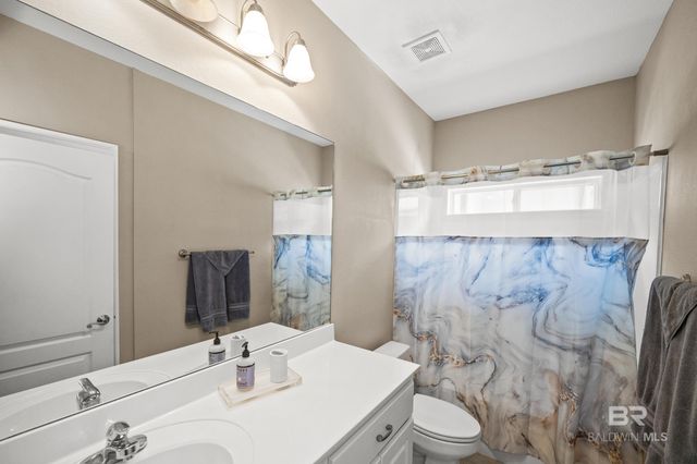 11 Lakeside Drive, Gulf Shores, AL 36542