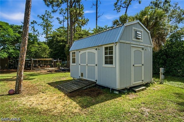 5737 Hidden Oaks LN, Naples, FL 34119